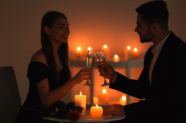 young-couple-drinking-wine-while-sitting-table-with-burning-candles_392895-105612